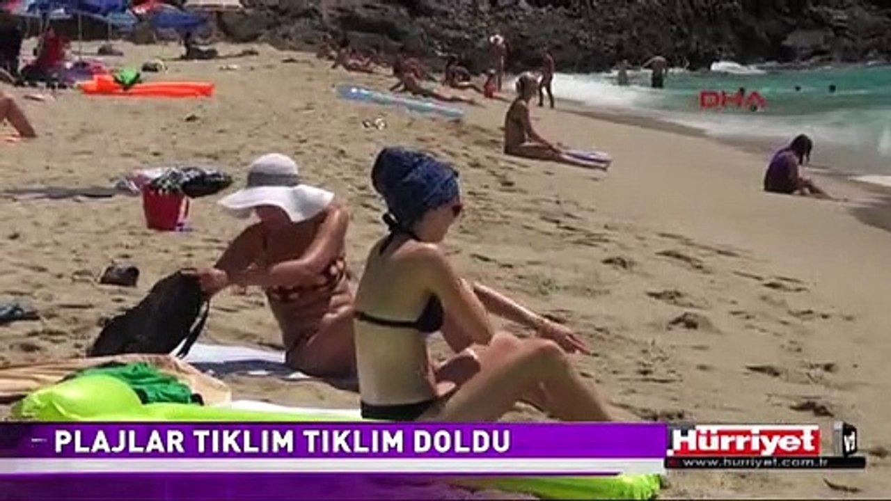 ANTALYA'DA SAHİLLER DOLDU TAŞTI