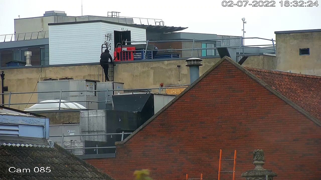 CCTV shows three teenage yobs climbing and dancing on a roof of derelict Boots shop
