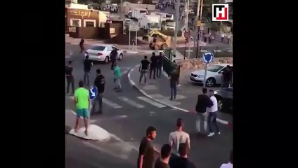 Kepçeyle kavgaya giren adam!