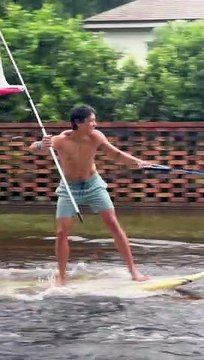 Surfing in the Street After Hurricane Ian