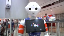 AI Robots at Taiwan Airport Welcome Visitors Back - TaiwanPlus News