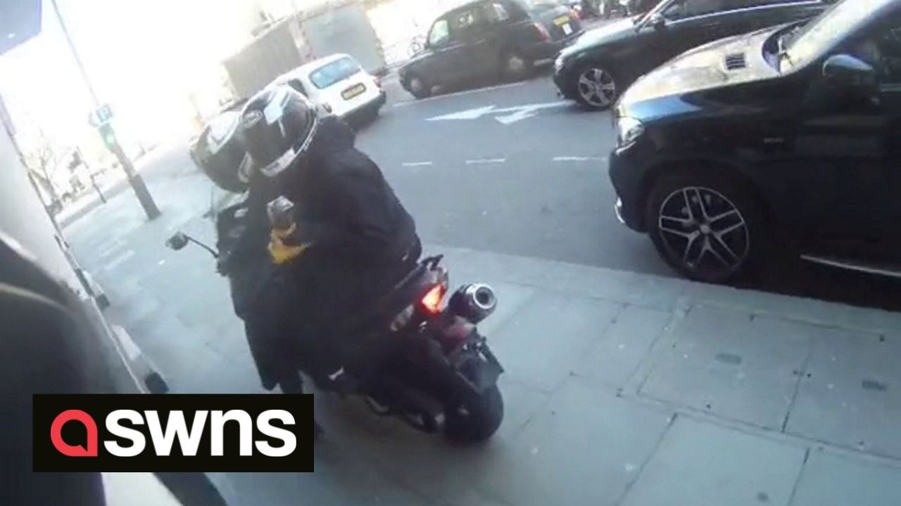 Motorcyclist stands up to thugs armed with ANGLE GRINDER who targeted him and his bike in central London