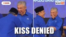 Tajuddin tries to kiss Zahid's hand at Umno event after suspension