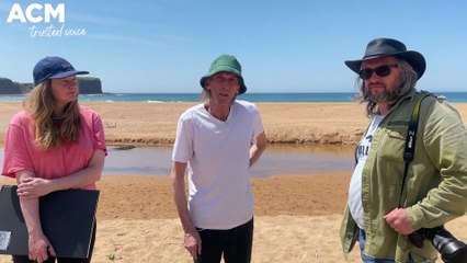 Artist Reg Mombassa  sketching at Bombo Beach