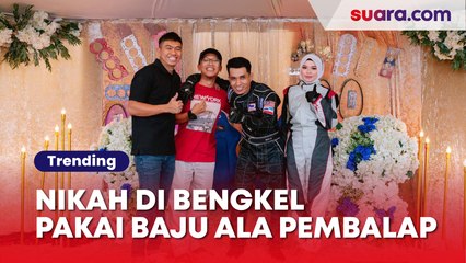 Pengantin Nikah di Bengkel Pakai Baju ala Pembalap