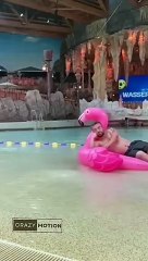 Funny small boy in pool