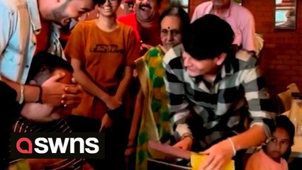 RAW: Father moved to tears after son flies 11,000 kilometers to surprise him on his 50th birthday