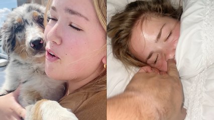 Loving guy surprises girl friend with a puppy as a token of appreciation