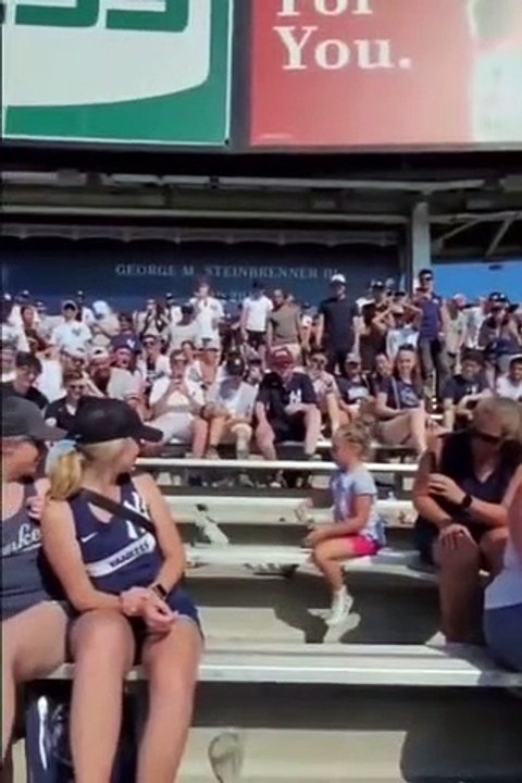 Crowd supporting girl trying to land the bottle trick
