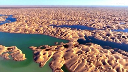شاهد: بحيرات نادرة بين كثبان صحراء الصين شكلتها فيضانات نهر تاريم