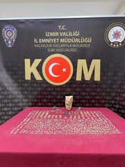 EVİNDE TARİHİ ESERLERLE YAKALANDI