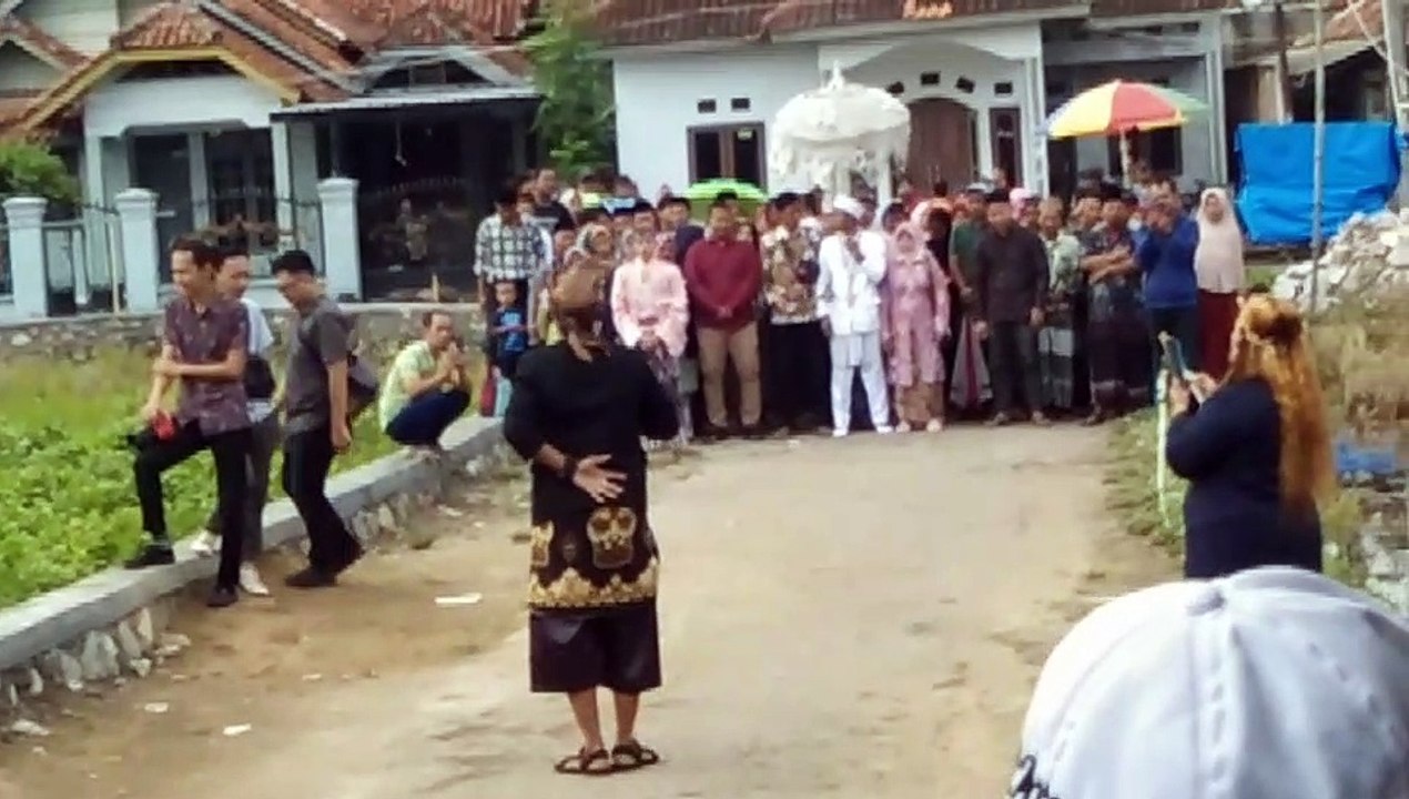 Prosesi penjemputan pengantin pria