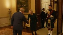 King Charles says ‘back again, dear, oh dear’ to Liz Truss as pair meet for second time in resurfaced video