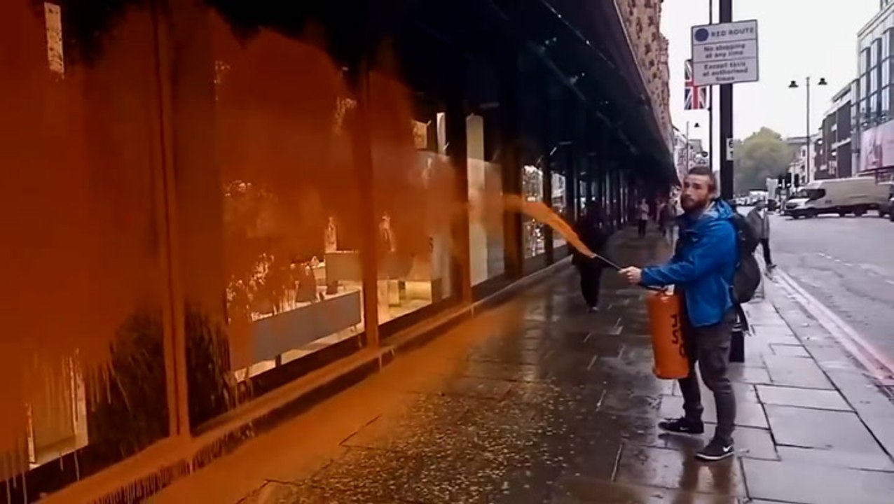 Just Stop Oil spray Harrods store with orange paint in latest protest
