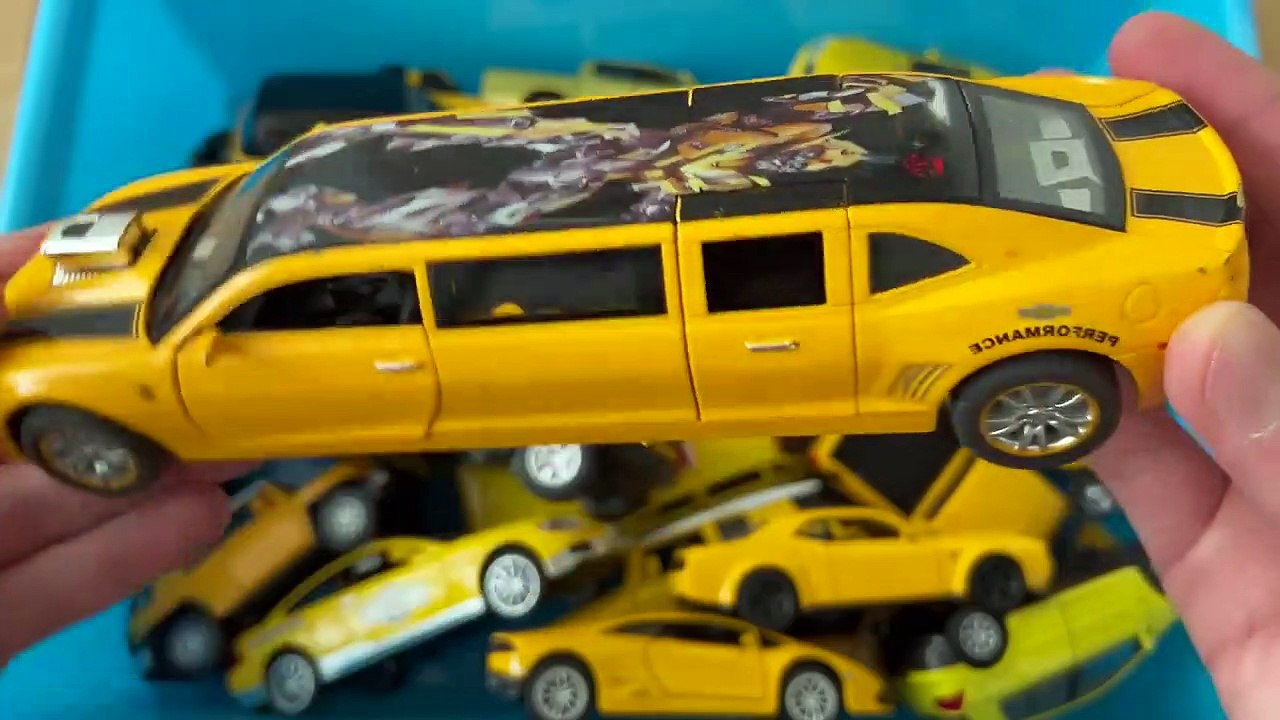 Lot Of Yellow Model Cars Shown From The Box video for childrens