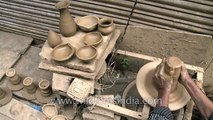 Making clay lamps or diyas for Diwali!