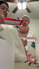 Baby Holds All the Things