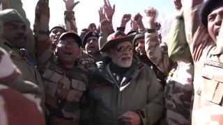 PM Modi offers sweets to the Jawans _ Bharat Mata Ki Jai chants reverberate across Kargil