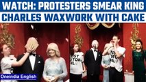 Just Stop Oil activists smear King Charles III waxwork with chocolate cake | Oneindia News*News