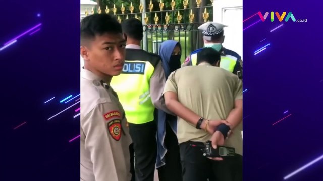 Tas Hitam dan Pistol Jenis FN Milik Wanita Bercadar Disita