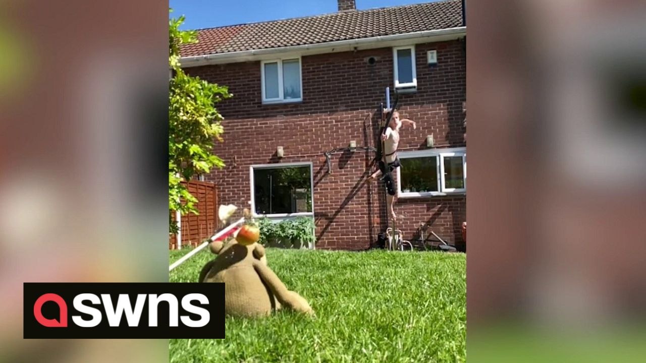 Dad combines pole-dancing and archery to perform incredible stunts, never missing his target