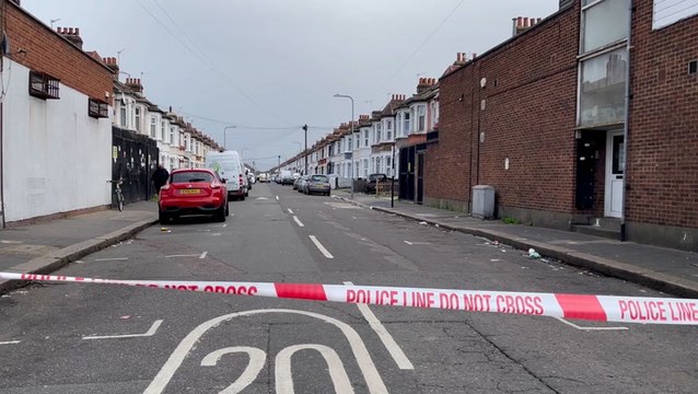 Police cordon off east London road after two killed in triple shooting