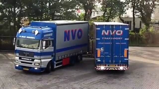 Camionista com kit de unhas mostra como se manobra um camião com reboque