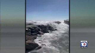 Video shows massive waves sweeping up people walking along South Beach boardwalk