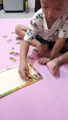 Playing puzzle kids
