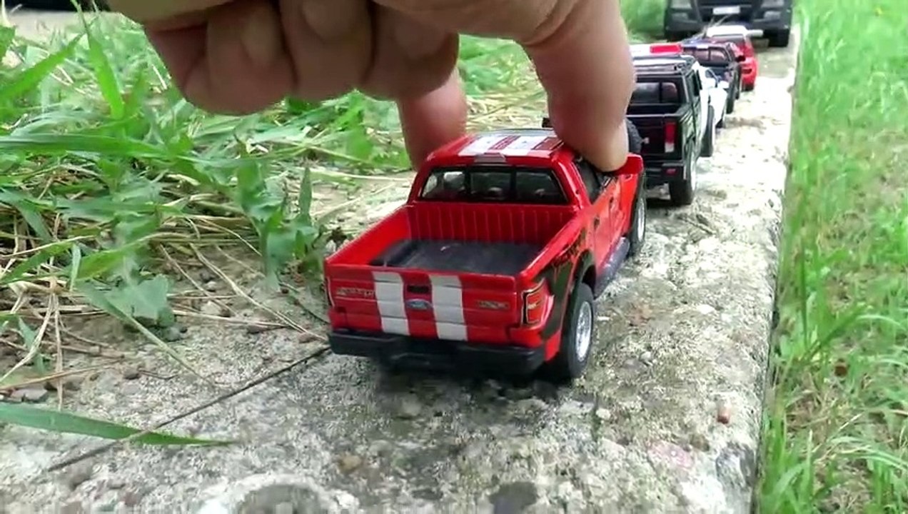 Driving diecast cars by hand on a concrete path car Toys for childern