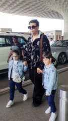 WatchVideo | Karan Johar with his children posed for the paps at Mumbai airport
