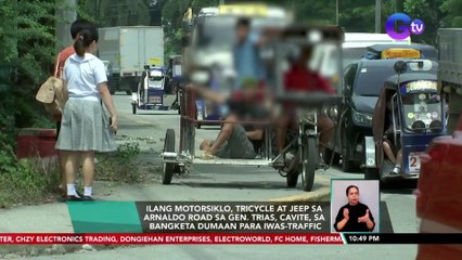 Ilang motorsiklo, tricycle at jeep sa Arnaldo Road sa Gen. Trias, Cavite, sa bangketa dumaan para iwas-traffic | SONA