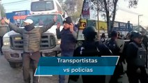 Transportistas intentan sacar sus unidades del corralón y se arma trifulca con policías