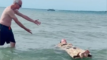 Man floats in special suit made from over 1,000 cork tops