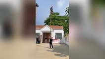 Daredevils perform acrobatic stunts on 20ft tall bamboo pole