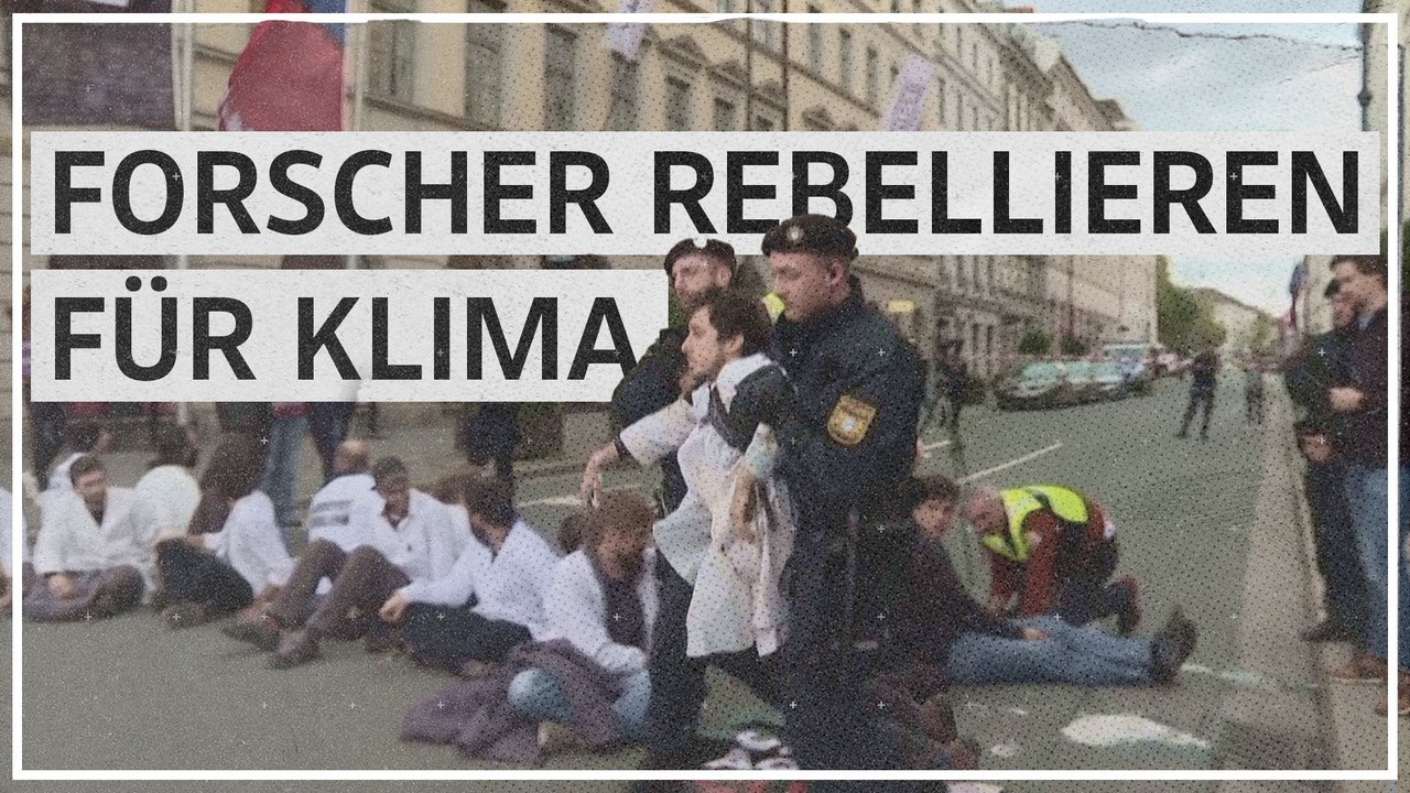Wissenschafter kleben sich für Klimaschutz an Münchner Odeonsplatz fest