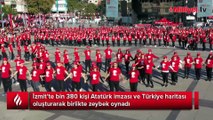 Atatürk imzası ve Türk haritası oluşturan bin 380 kişi birlikte zeybek oynadı