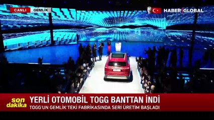 Download Video: Togg fabrikasındaki ilk araç banttan indi...  Erdoğan, sürücü koltuğunda geçti