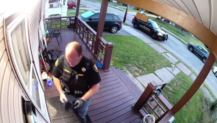 Sherriff Acting Strange on Front Porch Caught by Security Camera