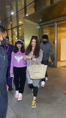 WatchVideo: Aishwarya Rai holds daughter Aaradhya's hand at the airport as she returns to Mumbai