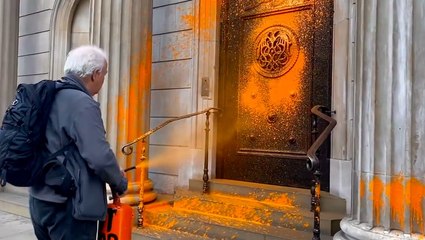 Just Stop Oil activists spray orange paint on Bank of England