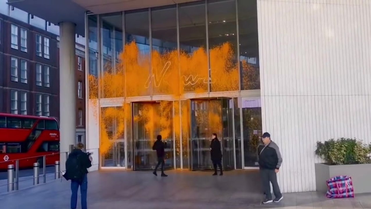 News UK entrance spray-painted orange by Just Stop Oil activists