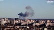 Kyiv hit by  Russian airstrikes  as explosions heard and plumes of smoke ri