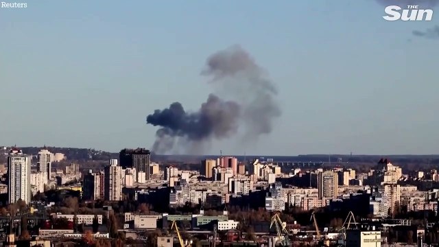 Kyiv hit by Russian airstrikes as explosions heard and plumes of smoke ri