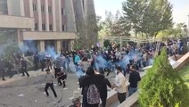 Iran regime enforcer fires weapon amid protests at University of North Tehran