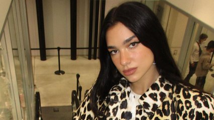 Dua Lipa Combined a Leopard Coat with an Even Bolder Pair of Gold Knee-High Boots
