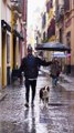 Man Holds Umbrella for His Dog While It Rains