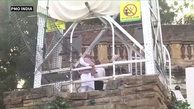 India's Prime Minister Modi visits site of deadly bridge collapse