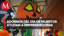 Empresarias crean piñatas y adornos inspirados en Día de Muertos y Halloween