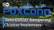 Employees of Chinese iPhone producer Foxconn leave factory over COVID restrictions